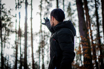 Man standing in forest