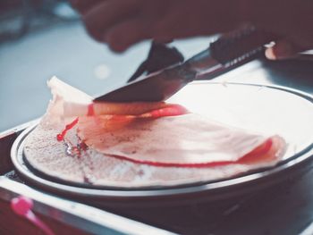 Close-up of hand food crep