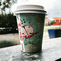 Close-up of coffee cup on table