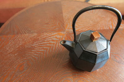 High angle view of teapot on table