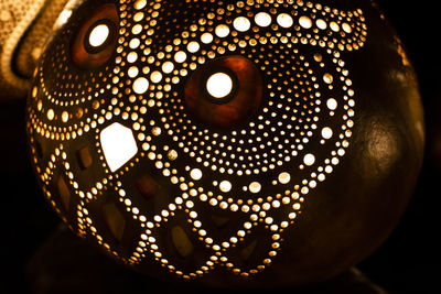 Close-up of illuminated electric lamp