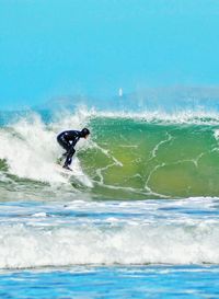 Man surfing in sea