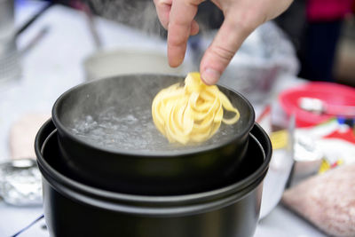 Close-up of hand holding ice cream
