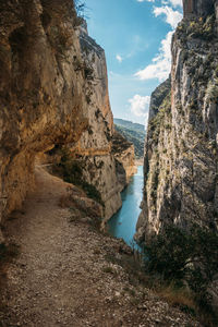 Footpath carved on the rock of montrebei gorge or congost de mont-rebei, lleida, catalonia, spain