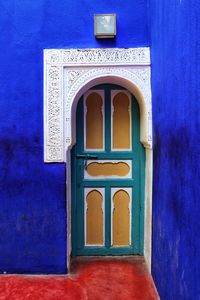 Low angle view of closed door of building
