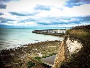 Scenic view of beach against sky