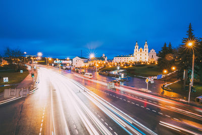 High angle view of light trails on road at night