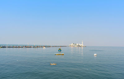 Scenic view of sea against clear sky