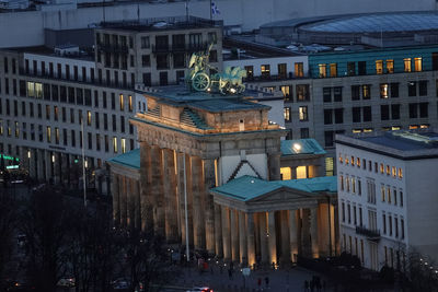 High angle view of buildings at night