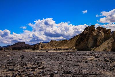 Panoramic view of arid landscape against sky