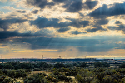 Scenic view of dramatic sky over land