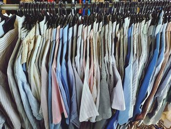 Panoramic view of clothes for sale in market