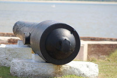 Close-up of water pipe on land