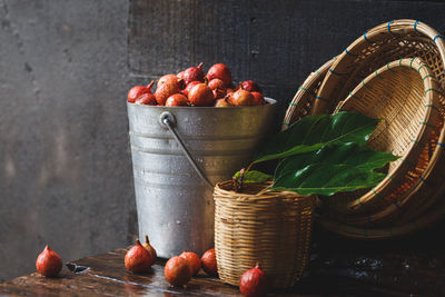 Close-up of vietnamese figs on bucket