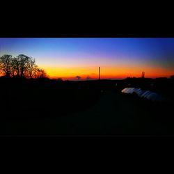 Scenic view of landscape at sunset