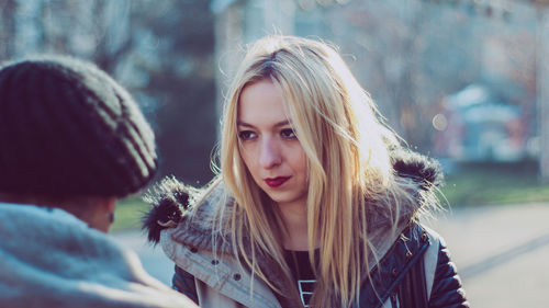 Portrait of young woman in winter