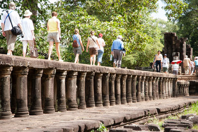 High angle view of people standing on steps