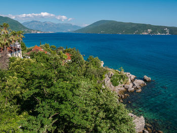 Scenic view of sea against blue sky