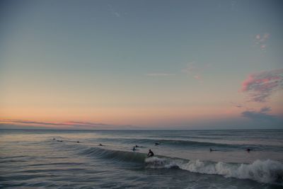 Scenic view of sea against sky during sunset