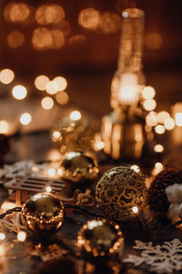 Close-up of illuminated christmas lights on table