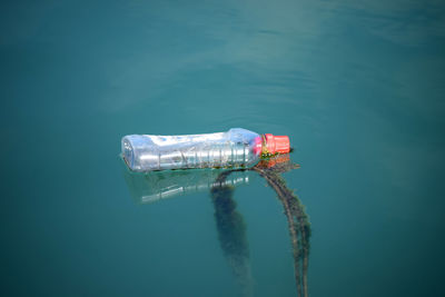 High angle view of floating on sea