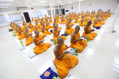 Monks reading book in temple