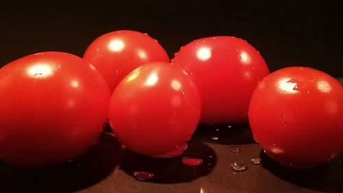 Close-up of red water over black background