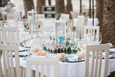 Empty chairs and tables at dining table