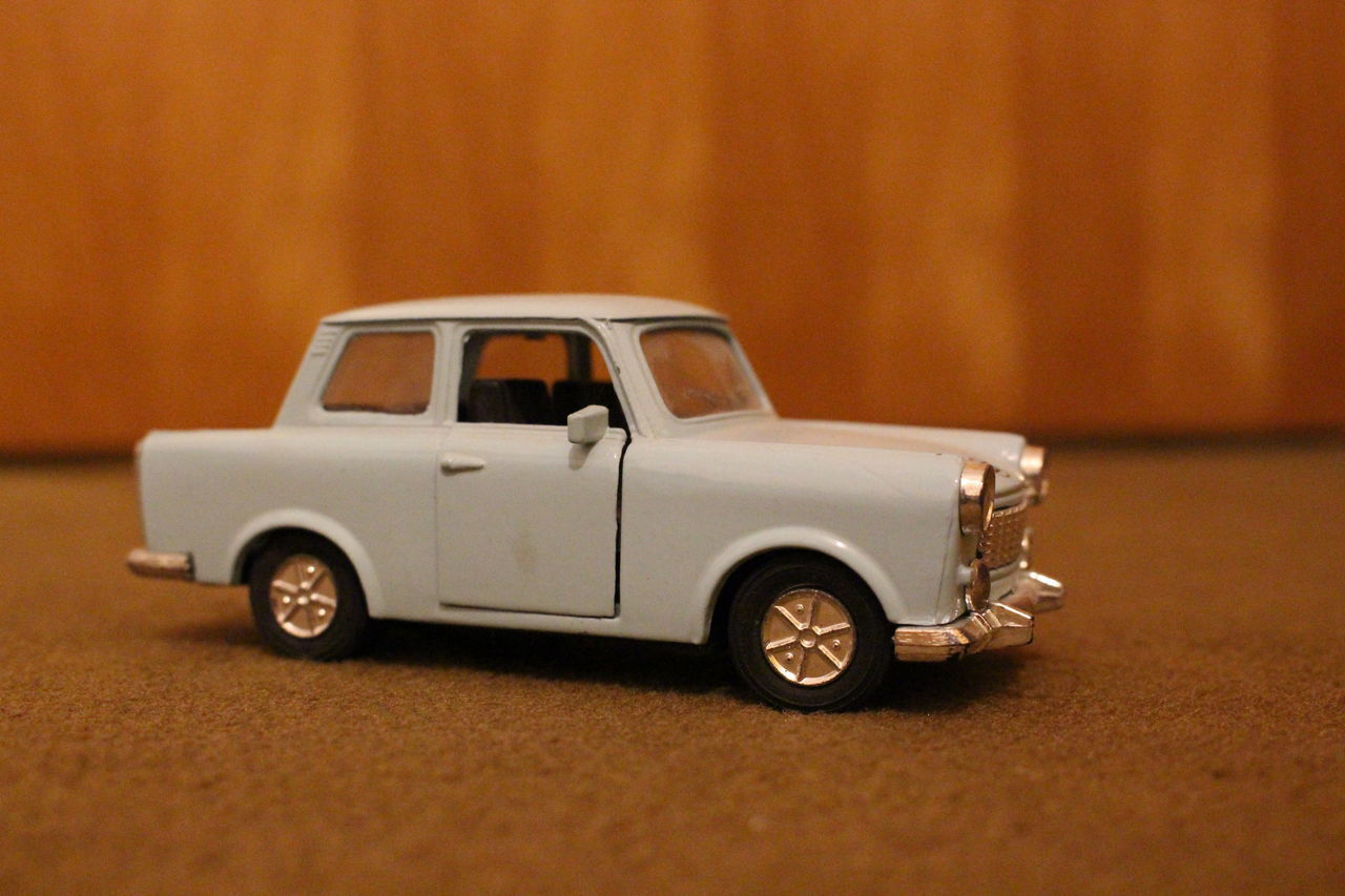 CLOSE-UP OF VINTAGE CAR TOY