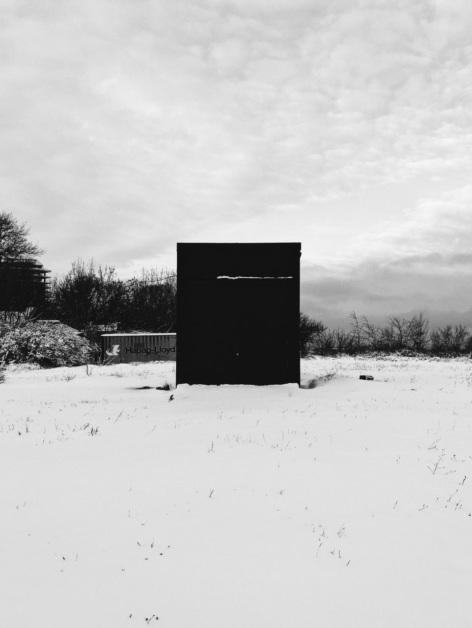 BUILT STRUCTURE ON FIELD AGAINST SKY