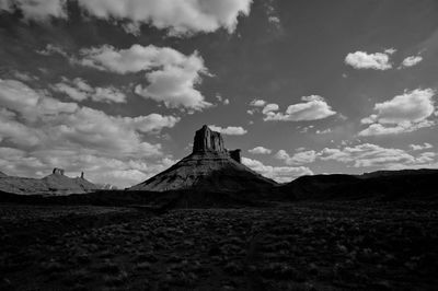 View of landscape against cloudy sky