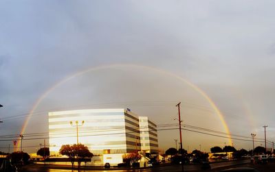 Rainbow over city