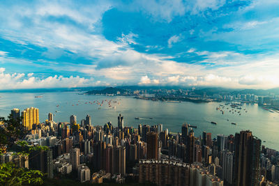 Panoramic view of bay against sky in city