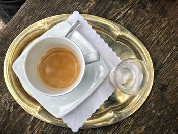 High angle view of coffee cup on table