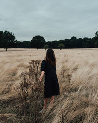 Woman standing on land