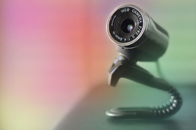 Close-up of security camera on table