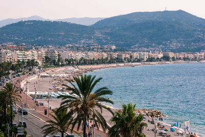 High angle view of city by sea