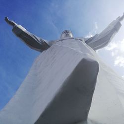 Low angle view of statue against sky