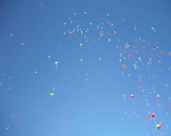 Low angle view of colorful balloons