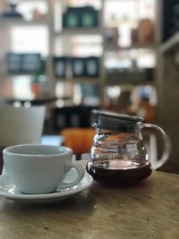 Close-up of coffee cup on table