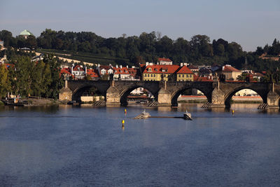 Bridge over river against clear sky