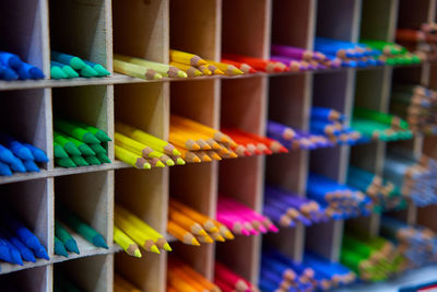 Close-up of multi colored pencils in store