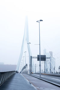 Erasmus bridge against sky during foggy weather