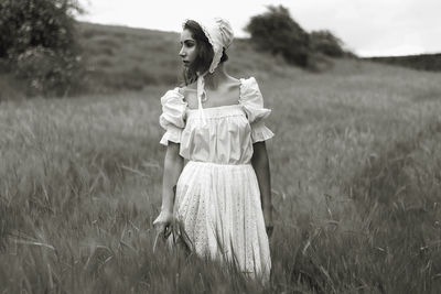 Woman standing on field