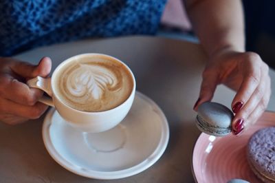 High angle view of coffee cup on table