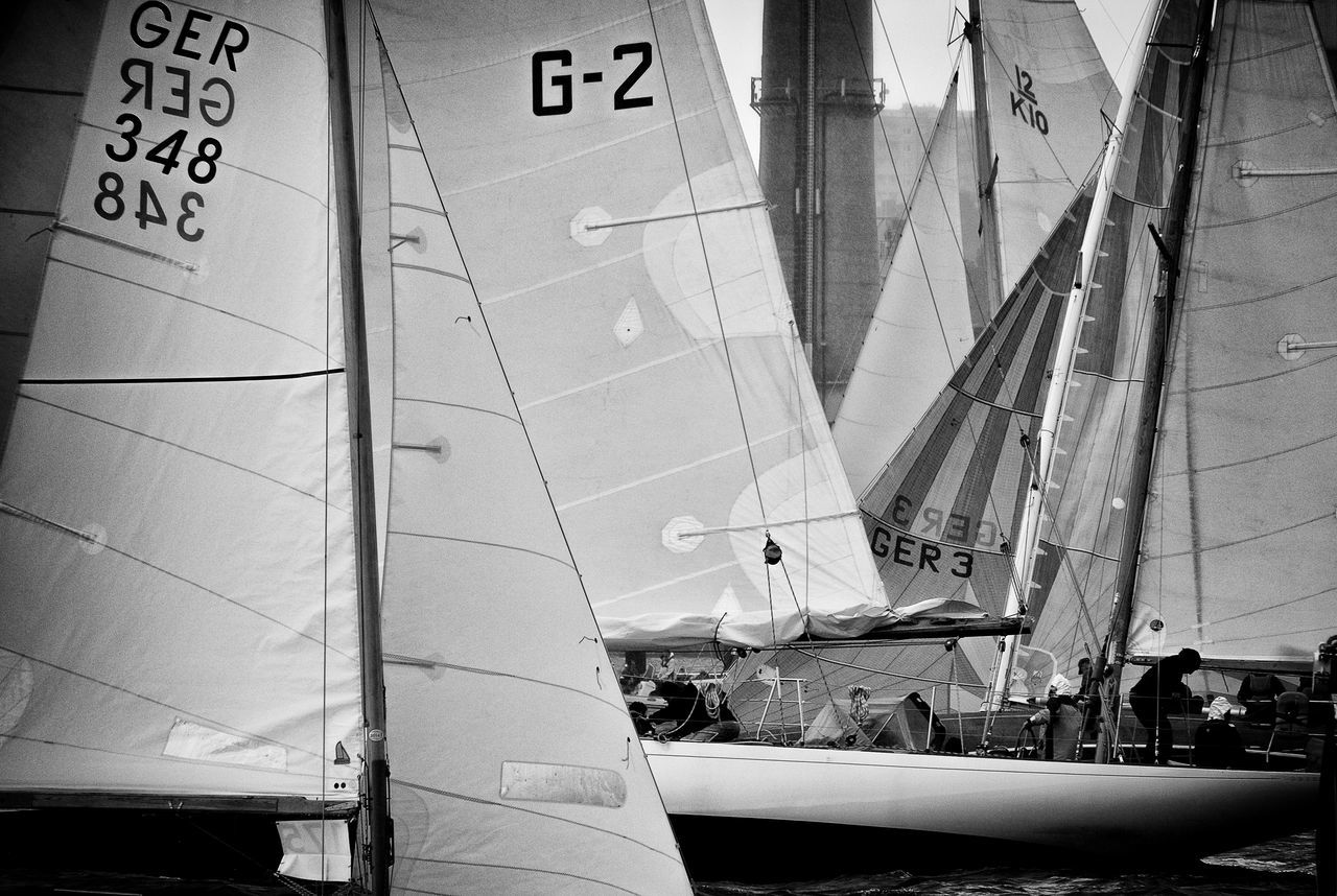 CLOSE-UP OF BOAT AGAINST WATER