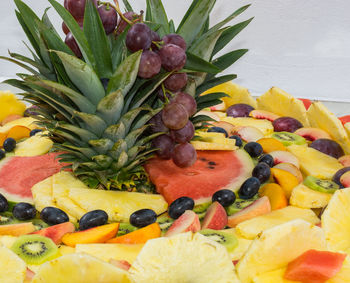 Close-up of multi colored fruits on flower