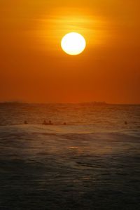 Scenic view of sea at sunset
