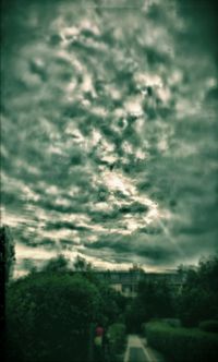Scenic view of landscape against cloudy sky