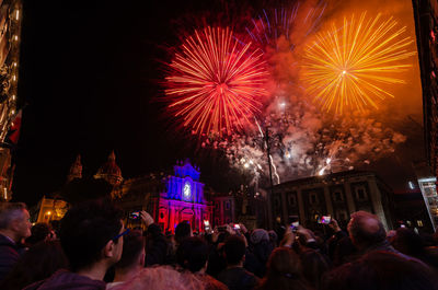 Firework display at night